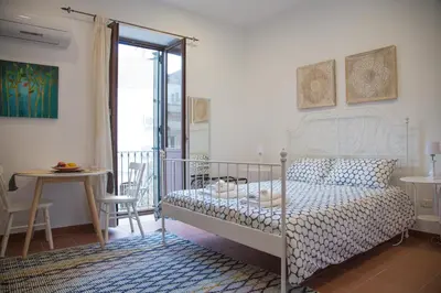 Letto o letti in una camera di Casa Miele Ortigia