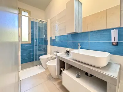 Bagno di Holiday Houses San Lorenzo La Pizzuta