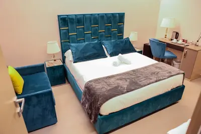 Letto o letti in una camera di B&B Suites&Rooms piazza dei martiri