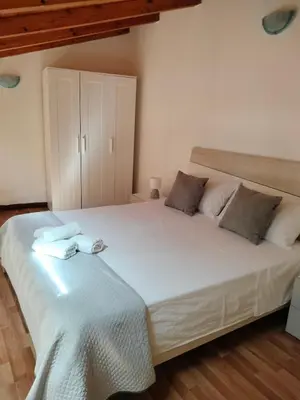 Letto o letti in una camera di Casa La Palma di Ortigia