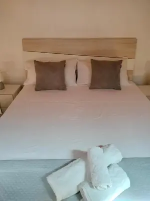 Letto o letti in una camera di Casa La Palma di Ortigia