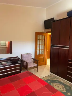 Letto o letti in una camera di Villa Rosa