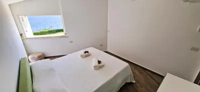Letto o letti in una camera di Casa Cambria