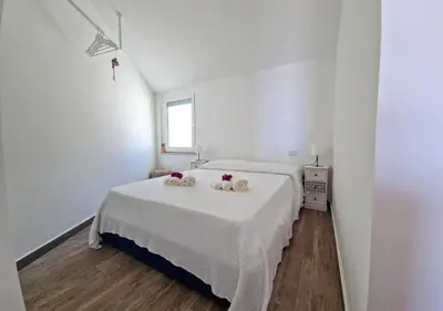 Letto o letti in una camera di Casa Cambria