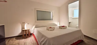 Letto o letti in una camera di Casa Cambria