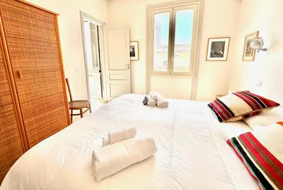 Letto o letti in una camera di Ortigia Terrazza Su Due Mari by Ortigia Apartm...