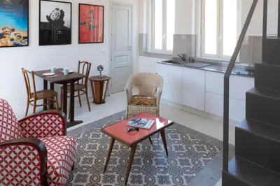 Area soggiorno di Ortigia Terrazza Su Due Mari by Ortigia Apartm...
