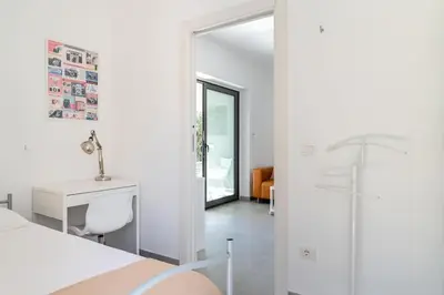 Letto o letti in una camera di Villa Pettegola Tenuta il Cavaliere di Italia Noto- Vista Mare Mini piscina idromassaggio