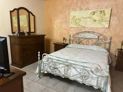 Letto o letti in una camera di Desiree Casa Vacanze
