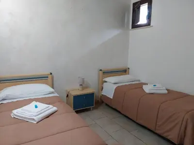 Letto o letti in una camera di Desiree Casa Vacanze