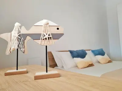 Letto o letti in una camera di Flora Plemmirio Home