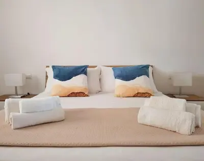 Letto o letti in una camera di Flora Plemmirio Home