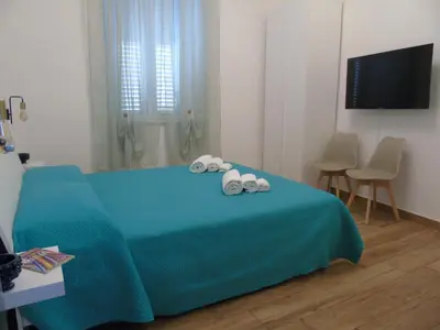 Letto o letti in una camera di La Perla sul Cortile