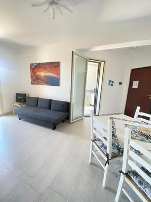 Area soggiorno di Mia House - Appartamento Marzamemi