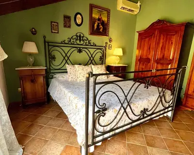 Letto o letti in una camera di Ludy suite house