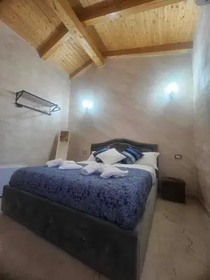 Letto o letti in una camera di Golden house sicily