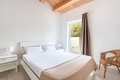Letto o letti in una camera di Villa Tuffetto Vista Mare Mozzafiato Piscina privata-Tenuta il Cavaliere d'Italia Noto