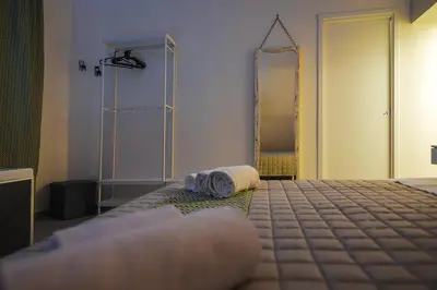 Letto o letti in una camera di Essenza Suite Siracusa con Jacuzzi privata