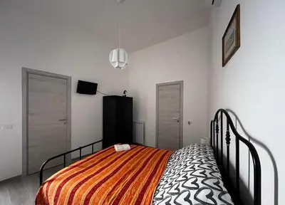Letto o letti in una camera di Casa O Sole mio
