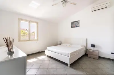 Letto o letti in una camera di Villa Karibu Avola
