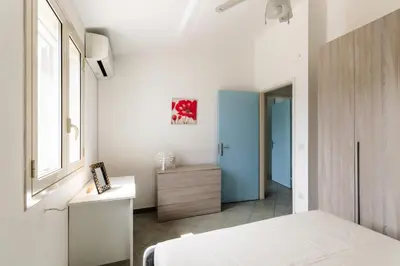 Letto o letti in una camera di Villa Karibu Avola