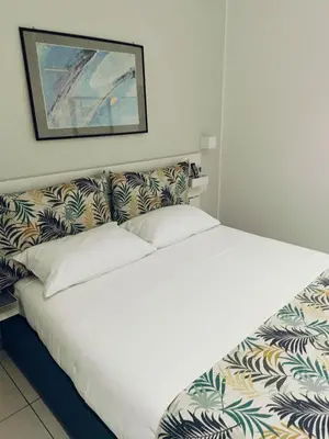 Letto o letti in una camera di casa Ierone l'etneo