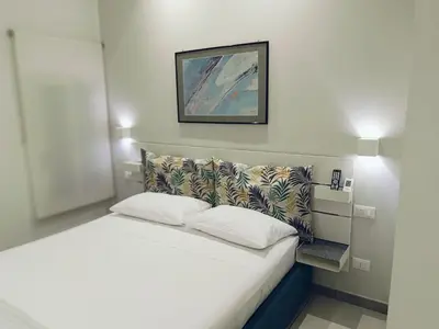 Letto o letti in una camera di casa Ierone l'etneo