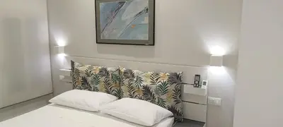 Letto o letti in una camera di casa Ierone l'etneo