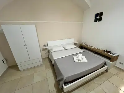 Letto o letti in una camera di L'Albero della Vita