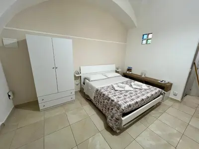 Letto o letti in una camera di L'Albero della Vita