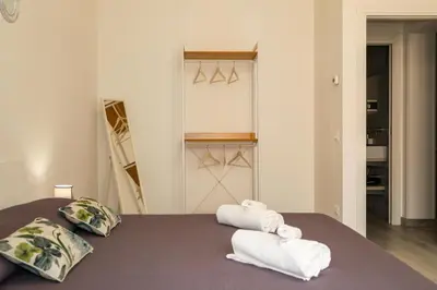 Letto o letti in una camera di Don Camillo Maison