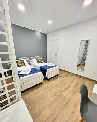 Letto o letti in una camera di Easy Room