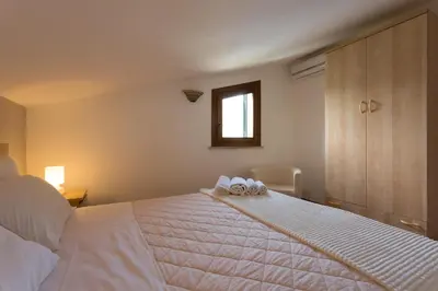 Letto o letti in una camera di Villa Calaforno