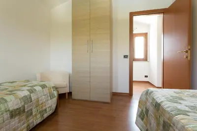 Letto o letti in una camera di Villa Calaforno