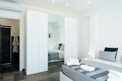 Letto o letti in una camera di Villa Paradiso plemmirio