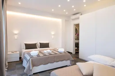 Letto o letti in una camera di Villa Paradiso plemmirio