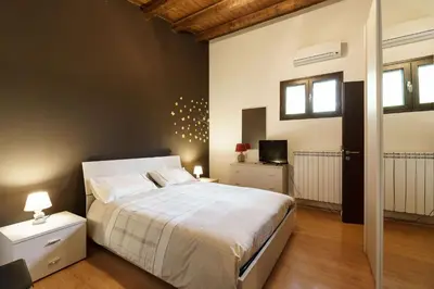 Letto o letti in una camera di Casa Michela