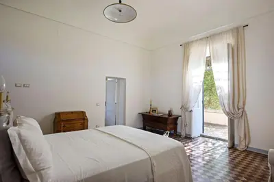 Letto o letti in una camera di Tenuta La Moresca