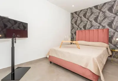 Letto o letti in una camera di MaCri House