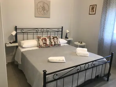 Letto o letti in una camera di HOUSES AL NITTA2