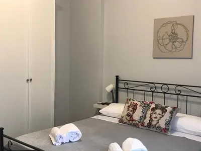 Letto o letti in una camera di HOUSES AL NITTA2