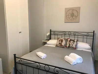 Letto o letti in una camera di HOUSES AL NITTA2