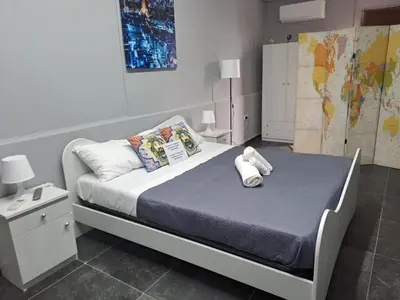 Letto o letti in una camera di Esmeralda Il Quadrifoglio Airport Fontanarossa