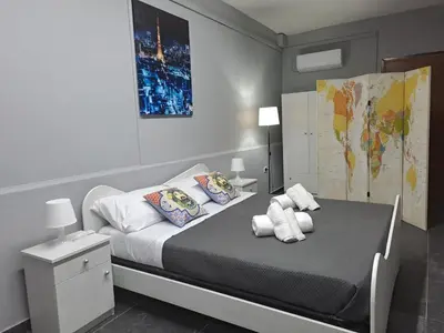 Letto o letti in una camera di Esmeralda Il Quadrifoglio Airport Fontanarossa