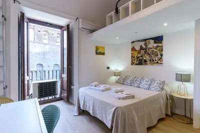 Letto o letti in una camera di monovano al duomo