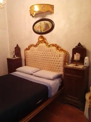 Letto o letti in una camera di Casa Santa Lucia