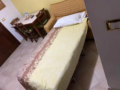 Letto o letti in una camera di Casa Vacanze Letizia
