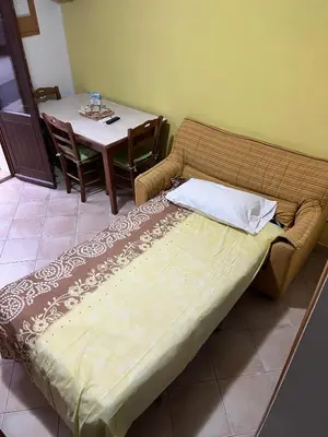 Letto o letti in una camera di Casa Vacanze Letizia