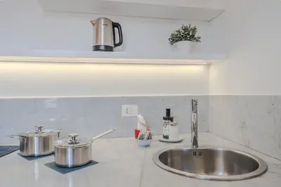Cucina o angolo cottura di Alma Maris Terrazza al Tempio by Bed&Bros