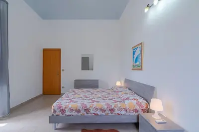 Letto o letti in una camera di Casa Intersimone